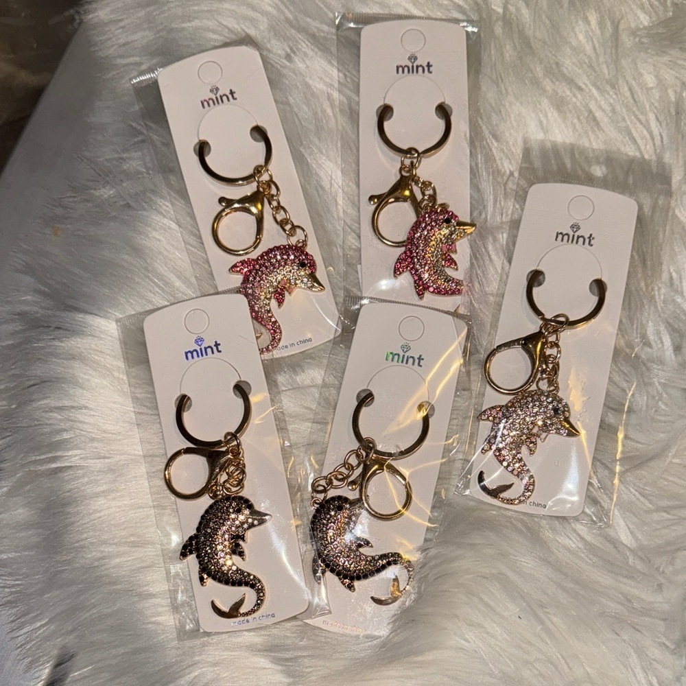 Mint Sparkling Dolphin Keychains in Pink, Black and White